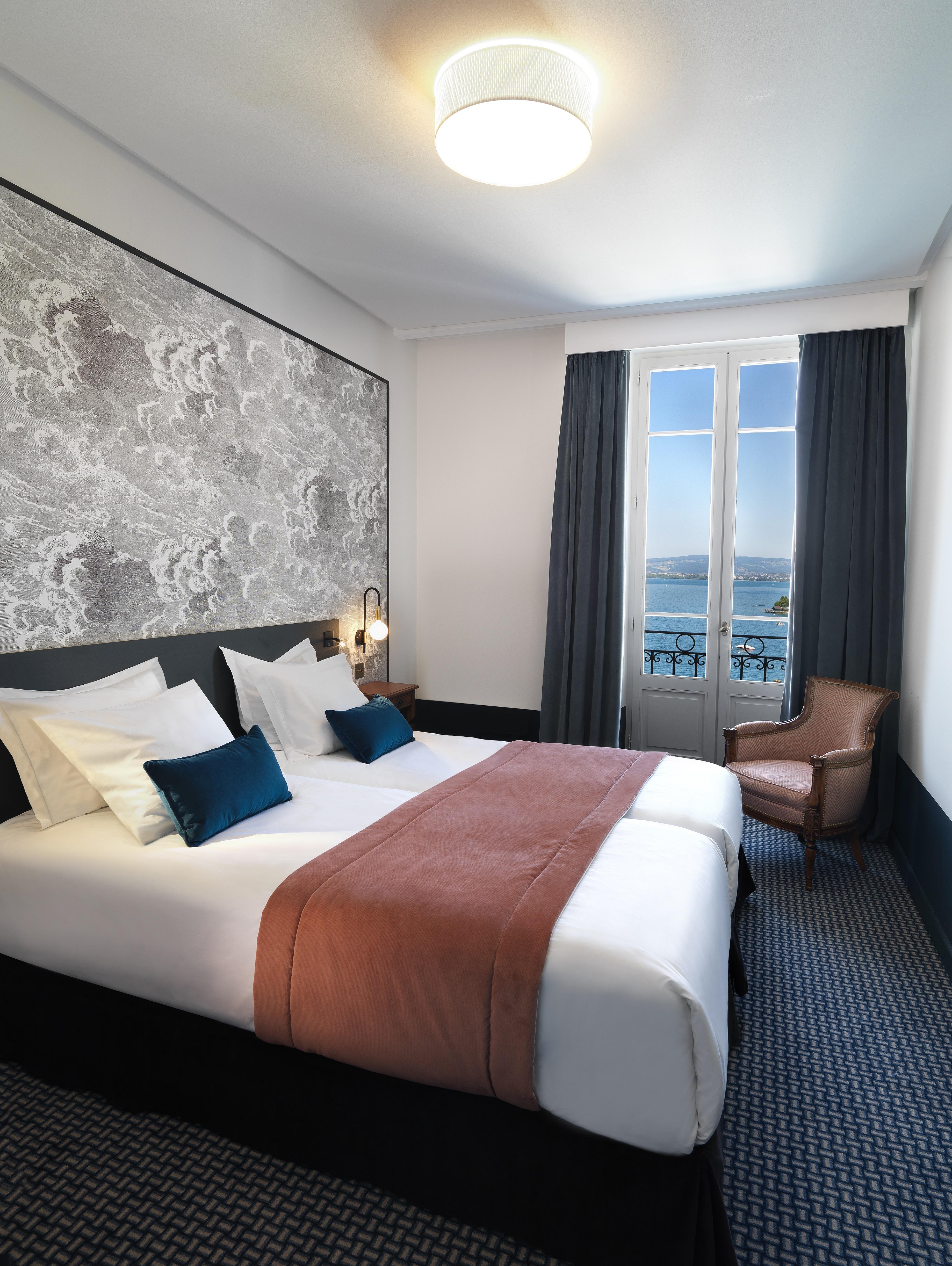 Le Palace De Menthon ภายนอก รูปภาพ A room at the hotel