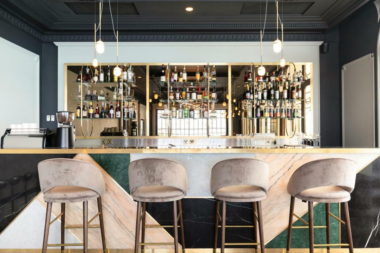 Le Palace De Menthon ภายนอก รูปภาพ The bar at the 2018 edition of the World Economic Forum
