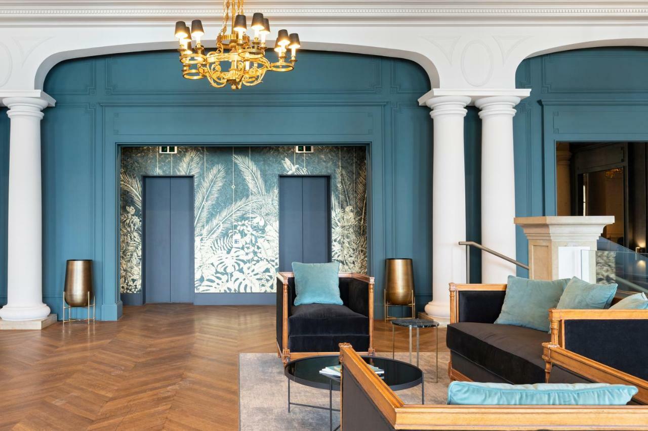Le Palace De Menthon ภายนอก รูปภาพ The lobby of the hotel